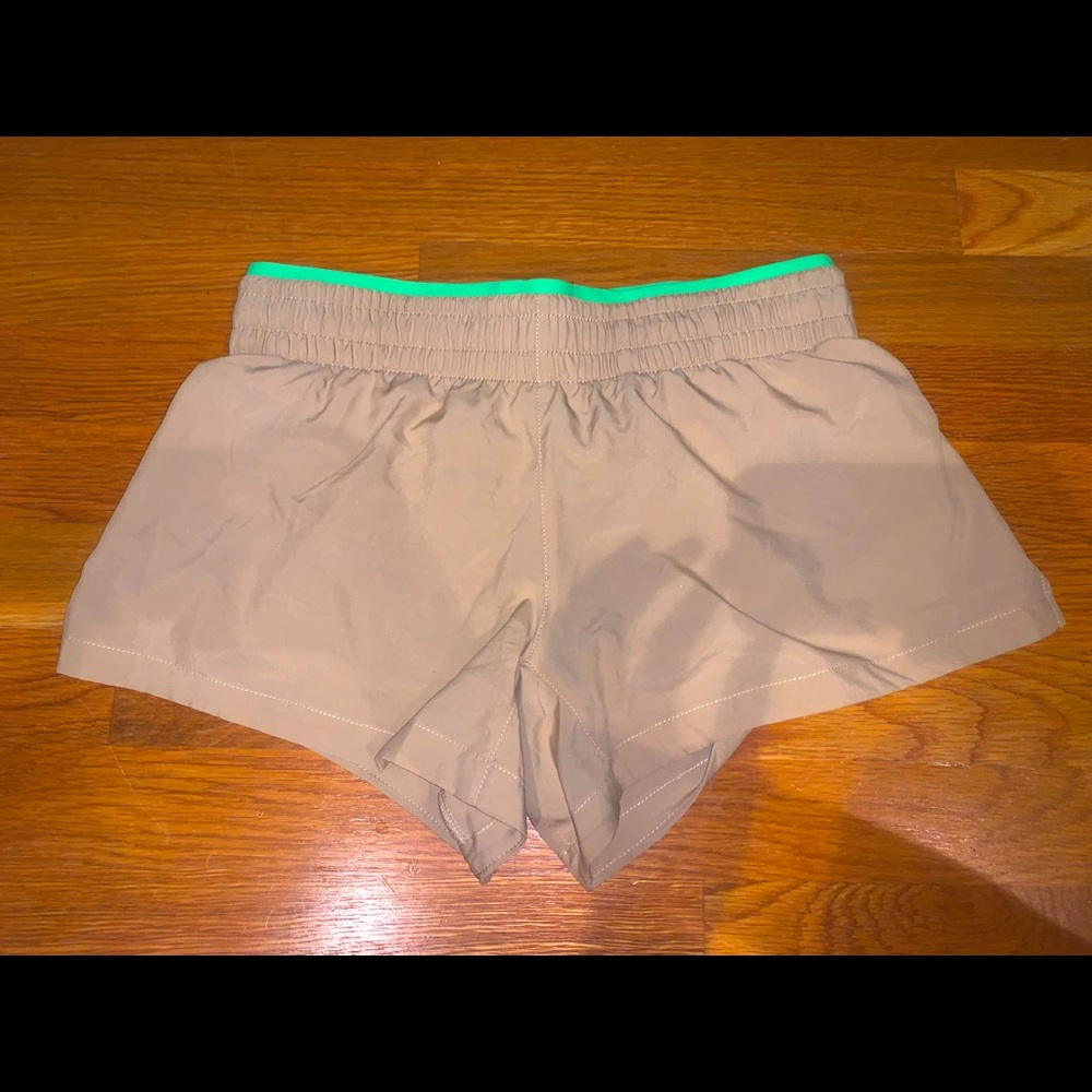 Fabletics Tan Running Shorts
